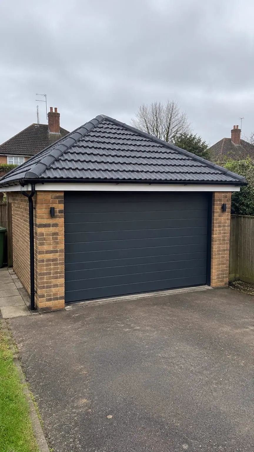 New tiled garage roof by MJA Roofing in Ashford